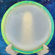 Load image into Gallery viewer, Top-down view of a blank white Eclipse glow Axiom Insanity fairway driver disc golf disc featuring a teal and yellow swirl GYRO rim.

