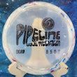 Load image into Gallery viewer, Top-down view of a white speckled DGA Pipeline fairway driver disc golf disc in Granite plastic featuring a 2025 Cole Redalen Tour Series metallic foil stamp.
