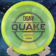 Load image into Gallery viewer, Top-down view of a neon yellow DGA Quake midrange disc golf disc in Atmos Sparkle plastic featuring a holographic circles foil stock Quake stamp.
