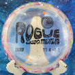 Load image into Gallery viewer, Top-down view of a cream speckled DGA Rogue distance driver disc golf disc in Granite plastic featuring a 2025 Eliezra Midtlyng Tour Series foil stamp.
