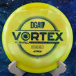 Load image into Gallery viewer, Top-down view of a yellow swirled DGA Catrina Allen Vortex fairway driver disc golf disc in Atmos plastic featuring a Catrina Allen signature series stamp.
