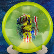 Load image into Gallery viewer, Top-down view of a neon yellow metal flake Discmania MD3 midrange disc golf disc in Metal Flake C-Line plastic featuring a multi-color flag foil Unearthed special edition stamp.
