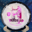 Load image into Gallery viewer, Top-down view of a black and white Discmania Vanguard fairway driver disc golf disc in Horizon S-Line plastic featuring a pink holographic foil Kyle Klein Creator Series stamp.
