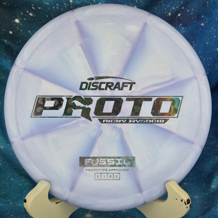"In-hand grip of the Discraft Fossil with its ringer-style top and micro-bead"
