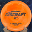 Load image into Gallery viewer, Discraft Zone SS approach disc in premium ESP Swirl plastic, featuring a low-profile rim and flat top designed for straight-to-overstable flights.
