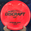 Load image into Gallery viewer, Discraft Zone SS approach disc in premium ESP Swirl plastic, featuring a low-profile rim and flat top designed for straight-to-overstable flights.
