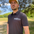Load image into Gallery viewer, Gravity Performance Polo - Black - Gravity Logo
