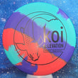 Load image into Gallery viewer, Top-down view of a brand new purple, teal, and red swirl Elevation Discs Koi putt and approach disc golf disc in EcoFLEX rubber featuring a black matte koi fish foil stamp.

