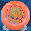 Load image into Gallery viewer, 173g Orange I-Blend Centurion featuring a Special Edition 3-foil Alien Head stamp in lime, red, and blue.
