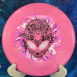 Load image into Gallery viewer, Top-down view of a pink Infinite Discs Cohort putt and approach disc golf disc in I-Blend plastic with a black, white, and purple three-foil Neon Alien Head stamp.
