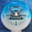 Load image into Gallery viewer, Top-down view of an Innova Destroyer Eveliina Salonen Commemorative distance driver disc golf disc in blue and white Party Time Duo plastic with a black and gold holographic foil stamp scaled at 173g.

