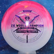 Load image into Gallery viewer, Top-down view of an Innova Destroyer Eveliina Salonen Commemorative distance driver disc golf disc in pink and white Party Time Duo plastic with a silver and purple holographic foil stamp scaled at 173g.
