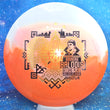Load image into Gallery viewer, Top-down view of an Innova Teebird Rainers Balodis Commemorative fairway driver in white and orange Duo Star plastic with black and gold holo foil stamp scaled at 175g.
