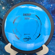Load image into Gallery viewer, Top-down view of a brand-new blue MVP Energy distance driver disc golf disc in Neutron plastic with a black GYRO overmold rim and black foil stock Energy logo stamp.
