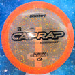Load image into Gallery viewer, Top-down view of a pre-owned neon orange Discraft Captain's Raptor very overstable fairway driver disc golf disc in Paul Ulibarri Confetti Z plastic scaled at 174g in 9.5 out of 10 uninked condition.
