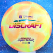 Load image into Gallery viewer, Top-down view of a pre-owned yellow and orange swirl Discraft Captain's Raptor very overstable fairway driver disc golf disc in Paul Ulibarri Z Swirl plastic scaled at 173g in 9 out of 10 uninked condition.
