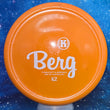 Load image into Gallery viewer, Top-down view of a pre-owned orange Dynamic Kastaplast Berg approach putter disc golf disc in OG PFN K2 Line plastic scaled at 175g in 8 out of 10 uninked condition.
