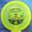 Load image into Gallery viewer, Top-down view of a pre-owned neon yellow 2016 Limited Edition Truly Unique Trilogy Man Westside Discs Warship midrange disc golf disc in VIP plastic scaled at 178g in brand new 10 out of 10 uninked condition.
