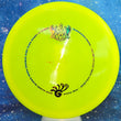 Load image into Gallery viewer, Top-down view of a pre-owned neon yellow 2018 Glass Blown Open Truly Unique double stamped Westside Discs Warship midrange disc golf disc in VIP plastic scaled at 169g in brand new 10 out of 10 uninked condition.

