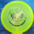 Load image into Gallery viewer, Top-down view of a pre-owned neon yellow Grow The Sport Trilogy Man edition Westside Discs Warship midrange disc golf disc in VIP plastic scaled at 178g in brand new 10 out of 10 uninked condition.
