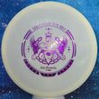 Load image into Gallery viewer, Top-down view of a pre-owned white Grow The Sport Trilogy Man edition Westside Discs Warship midrange disc golf disc in VIP plastic scaled at 177g in brand new 10 out of 10 uninked condition.
