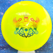 Load image into Gallery viewer, Top-down view of a pre-owned neon yellow Truly Unique Trilogy Man edition Westside Discs Warship midrange disc golf disc in VIP plastic scaled at 170g in brand new 10 out of 10 uninked condition.
