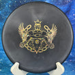 Load image into Gallery viewer, Top-down view of a pre-owned black Westside Harp approach disc golf disc featuring a Trilogy Man stamp in BT Soft plastic scaled at 175g in 9.5 out of 10 uninked storage wear condition.
