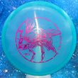 Load image into Gallery viewer, Top-down view of a pre-owned teal glow Discraft Buzzz 2022 Ledgestone edition midrange disc golf disc in Z Glow FLX plastic scaled at 179g in 9.5 out of 10 uninked condition.
