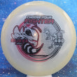 Load image into Gallery viewer, Top-down view of a pre-owned white Discraft Buzzz 2026 Worlds commemorative edition midrange disc golf disc in Mega Glow plastic scaled at 179g in brand new 10 out of 10 uninked condition.
