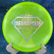 Load image into Gallery viewer, Top-down view of a pre-owned neon green translucent Discraft Buzzz event specialty stamp midrange disc golf disc in Z-Line plastic scaled at 180g in brand new 10 out of 10 uninked condition.
