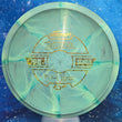 Load image into Gallery viewer, Top-down view of a pre-owned green and lime swirly Discraft Comet Michael Johansen tour series midrange disc golf disc in ESP Swirl plastic scaled at 178g in 7.5 out of 10 inked condition.
