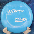 Load image into Gallery viewer, Pre-owned Innova Destroyer in blue Pro plastic. This variant is rated 9/10 condition, scaled at 175g, and is inked. A high-performance distance driver with a comfortable, tacky grip for all weather conditions.
