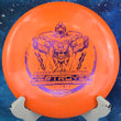 Load image into Gallery viewer, Pre-owned Innova Destroyer in orange Star plastic. This Ricky Wysocki "Sockibot" variant is rated 7/10 for condition and is inked. Scaled at 172g. A high-speed, overstable driver popular with professional disc golfers.
