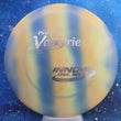 Load image into Gallery viewer, Top-down view of a pre-owned white and blue tie-dye swirl Innova Valkyrie distance driver disc golf disc in penned I-Dye Pro plastic scaled at 174g in 7.5 out of 10 condition with ink on back.
