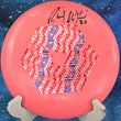 Load image into Gallery viewer, Pre-owned Innova Wraith in salmon Star plastic. This variant is hand-signed by Ricky Wysocki and features the limited edition Sockibomb stamp. Rated 9.5/10 condition, unthrown, and scaled at 170g. A premium collector-grade disc golf disc.
