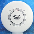 Load image into Gallery viewer, Top-down view of a pre-owned white Latitude 64 Peak beadless putter disc golf disc in Zero Pro plastic featuring a black stamp scaled at 174g in 9 out of 10 uninked condition.
