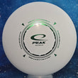 Load image into Gallery viewer, Top-down view of a pre-owned white Latitude 64 Peak beadless putter disc golf disc in Zero Pro plastic featuring a green stamp scaled at 174g in 9 out of 10 uninked condition.
