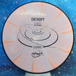 Load image into Gallery viewer, Top-down view of a pre-owned pink and cream swirl MVP Entropy overstable putt and approach disc golf disc in Cosmic Neutron plastic scaled at 175g in 7.5 out of 10 condition with ink on bottom.
