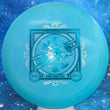 Load image into Gallery viewer, Top-down view of a pre-owned blue Prodigy FX-2 Ezra Robinson 2024 signature series fairway driver disc golf disc in 400 plastic scaled at 170g in 7.5 out of 10 inked condition.
