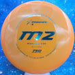 Load image into Gallery viewer, Top-down view of a pre-owned orange Prodigy M2 overstable midrange disc golf disc in premium 750 plastic scaled at 179g in 9.5 out of 10 uninked condition.
