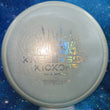 Load image into Gallery viewer, Top-down view of a pre-owned white Prodigy M4 neutral-to-understable midrange disc golf disc in 500 plastic featuring a silver custom stamp scaled at 173g in 9.5 out of 10 uninked condition.

