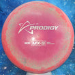 Load image into Gallery viewer, Top-down view of a pre-owned pink and teal sparkle Prodigy MX-3 stable midrange disc golf disc in 500 Spectrum plastic scaled at 174g in 8 out of 10 uninked condition.
