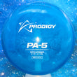 Load image into Gallery viewer, Top-down view of a pre-owned blue Prodigy PA-5 understable putt and approach disc golf disc in 400 plastic with stock hot stamp scaled at 175g in 8 out of 10 inked condition.
