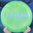 Load image into Gallery viewer, Top-down view of a pre-owned lime green out-of-production 2022 Ledgestone Edition Discraft Crush distance driver disc golf disc in Z Swirl plastic scaled at 172g in 9.5 out of 10 uninked condition.
