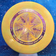 Load image into Gallery viewer, Top-down view of a yellow and orange swirl pre-owned Discraft Luna putt and approach disc golf disc in Battle Pack ESP plastic with a metallic blue foil Luna Battle Pack character stamp.
