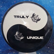 Load image into Gallery viewer, Top-down view of a pre-owned black and white Truly Unique Ying Yang Dynamic Discs Convict fairway driver disc golf disc in Fuzion DyeMax plastic scaled at 174g in 10 out of 10 uninked bag kept condition.
