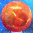 Load image into Gallery viewer, Top-down view of a pre-owned metallic red blank stamped Dynamic Discs Criminal fairway driver disc golf disc in Lucid plastic scaled at 168g in 10 out of 10 uninked condition.
