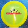 Load image into Gallery viewer, Top-down view of a pre-owned neon yellow First Run Dynamic Discs Criminal fairway driver disc golf disc in Lucid plastic with bar stamp scaled at 174g in 10 out of 10 uninked condition.
