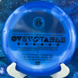 Load image into Gallery viewer, Top-down view of a pre-owned blue HandEye Supply Co stamped Dynamic Discs Criminal fairway driver disc golf disc in Lucid plastic scaled at 176g in 9 out of 10 inked condition with ink stamp on back.
