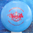 Load image into Gallery viewer, Top-down view of a pre-owned blue Truly Unique Midwest Championship stamped Dynamic Discs Freedom distance driver disc golf disc in Fuzion plastic scaled at 174g in 10 out of 10 uninked condition.
